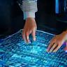 Two network engineers collaborating on a technical blueprint