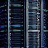 Server racks with glowing lights, symbolizing continuous operation